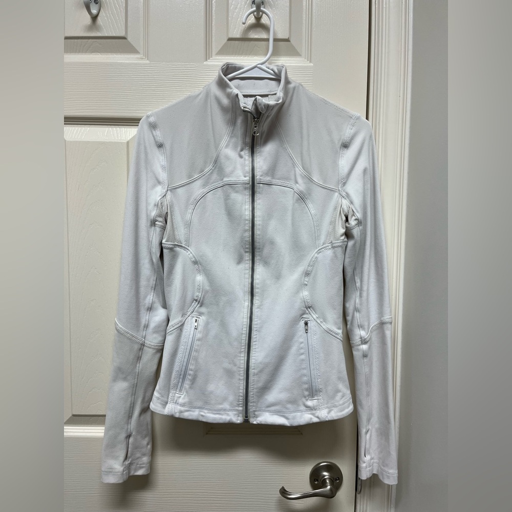 Lululemon define size 4. Used but still lots of life in it